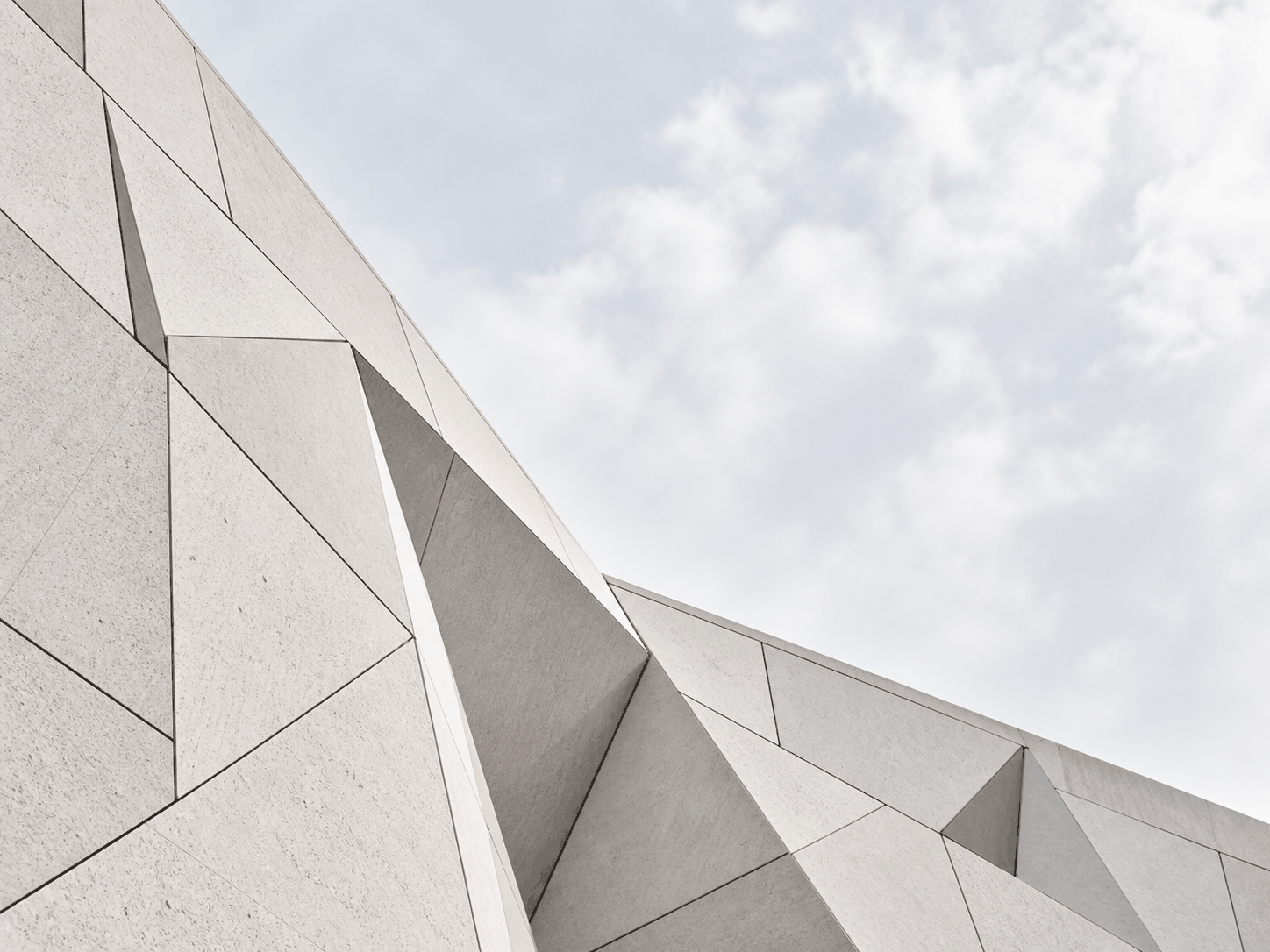 Modern architectural composition with geometric concrete panels